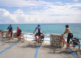 cyclist on sea shore