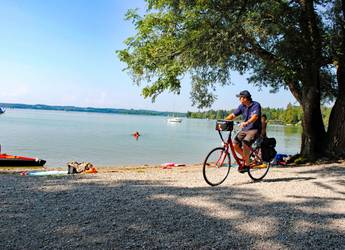 cyclist near lake